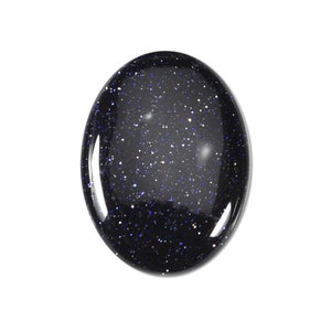 May include: A smooth, oval-shaped blue sandstone stone with a speckled, starry appearance.