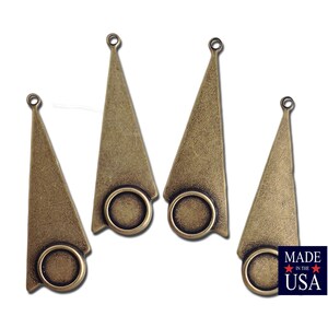 May include: Four antique gold-toned metal triangle-shaped pendant charms with a round circle cutout at the bottom. Each charm has a loop at the top for attaching to a necklace or bracelet.