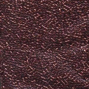 May include: A close-up view of a large quantity of small, dark red, metallic seed beads.