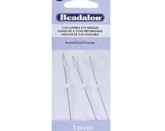 May include: A package of Beadalon collapsible eye needles. The package is white and purple, with the brand name and product description printed on the front. The package contains three needles, each with a collapsible eye. The package is 2.5 inches in length.