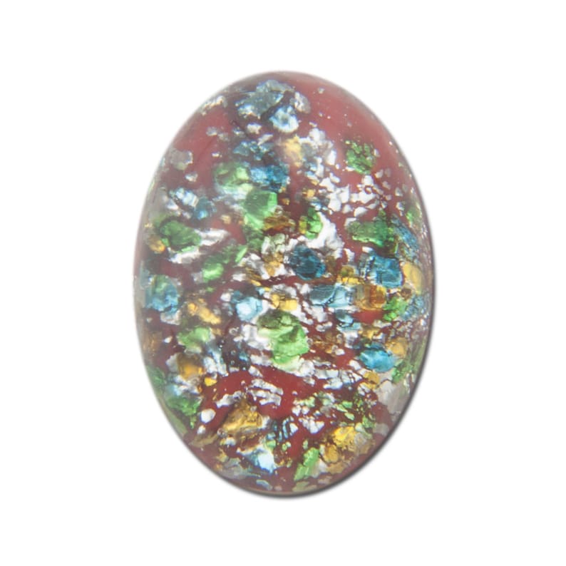May include: An oval-shaped cabochon with a smooth, polished surface. The base color is a deep, solid red, which is densely embedded with reflective, multi-colored metallic flakes in shades of bright green, sky blue, and shimmering gold.