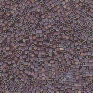 May include: A close-up of a large quantity of small, square, iridescent glass beads in shades of purple, brown, and beige.