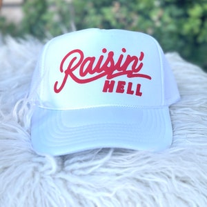 Raising hell trucker hat, women’s trucker hat, lake hat, river hat
