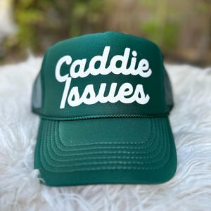 Caddie issues trucker hat, women’s trucker hat, golf hat