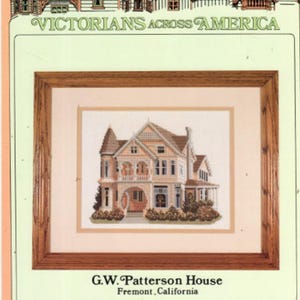 May include: Cross-stitch pattern for the G.W. Patterson House in Fremont, California. The pattern features a detailed illustration of a Victorian-style house with a porch and landscaping. The pattern is titled "Victorians Across America" and is by Debbie Patrick. The price is £4.95.