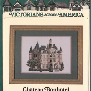 May include: A cross-stitch pattern of a large, ornate Victorian-style chateau with a grey roof, white trim, and many windows. The chateau is surrounded by a small garden and is set against a light blue sky. The text "Château Bonhôtel Ligny-le Ribault, France" is printed below the image.