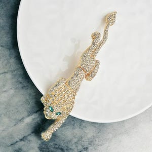 Rhinestone Lion Brooch: Gold-Tone Costume Jewelry