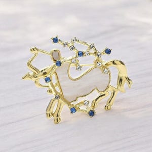 Broche de la constelación de Sagitario: Pin del zodiaco con diamantes de imitación