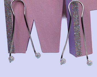 Aurora Borealis Car hooks x 2 for walking sticks, great for bags, umbrellas. Simple to use, great ideas for the person who has everything.