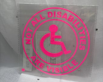 Disabled Car Badge, wheelchair in pink, not all disabilities are visible.
