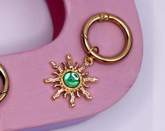 Pair of Sun Charm Green Stone, accessory for walking sticks, phones and bags. Great idea for keys , trainers and boots.
