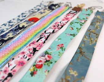 Walking Sticks Accessory-Lanyards: walking stick and mobile phone security straps.