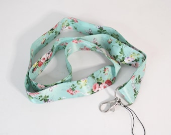 Lanyard, flowery on blue. Detachable neck strap. Perfect for walking sticks and  name cards, Phone connector including.