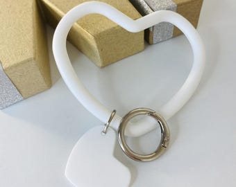 White heart wrist strap, great for phones a well as walking sticks . Premium hand wristlet, durable, safety mobile accessories