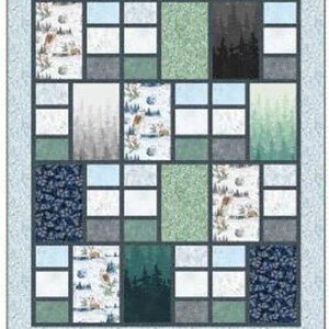 May include: A quilt pattern titled Divisions A Pieced Quilt by Quilting Renditions My Design...Your Beautiful Rendition. The design features a rectangular grid of varied fabric blocks in shades of blue, green, white, and dark gray, with forest and animal motifs.