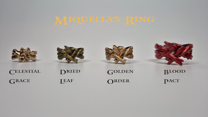 May include: Four different coloured rings with a unique design. The rings are labelled "Celestial Grace", "Dried Leaf", "Golden Order", and "Blood Pact".