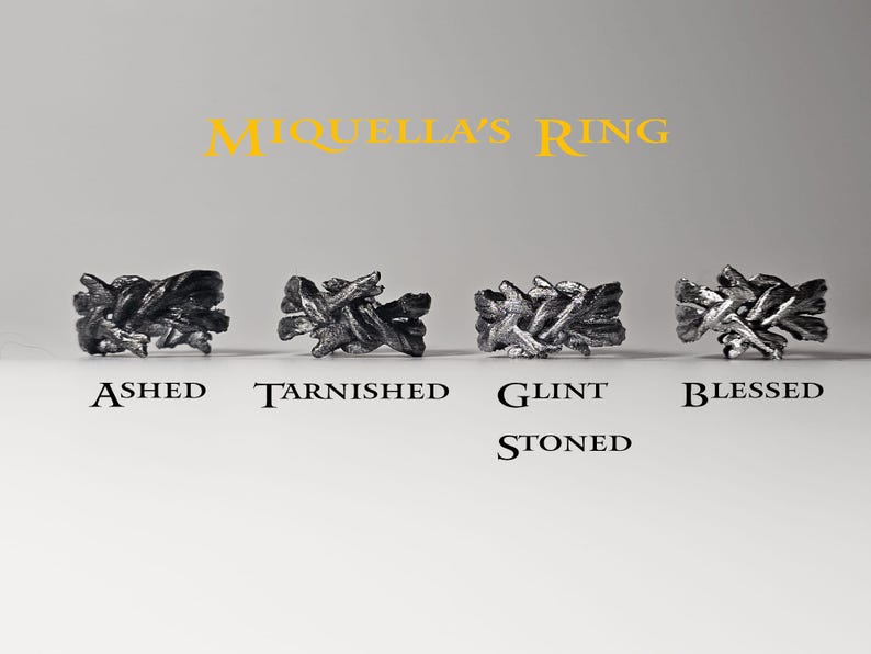 May include: Four silver rings with different finishes, labelled "Ashed", "Tarnished", "Glint Stoned", and "Blessed".