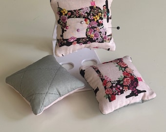 Pincushion made with decorative sewing machine print on 100% cotton fabric and tiny ironing pad on the back for tiny projects