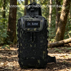 May include: A camouflage chest bag with a black hexagonal grid overlay and a rectangular patch featuring the text Dr. Butter. The bag includes dual zipper closures, a top handle, and adjustable straps, designed for carrying gear outdoors.