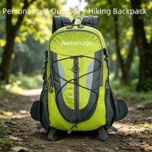 May include: A lime green and dark grey hiking backpack featuring a central vertical zip, adjustable black bungee cords, side mesh pockets, and padded shoulder straps. The text "Personalized Outdoor / Hiking Backpack" and "Name/Logo" are visible.