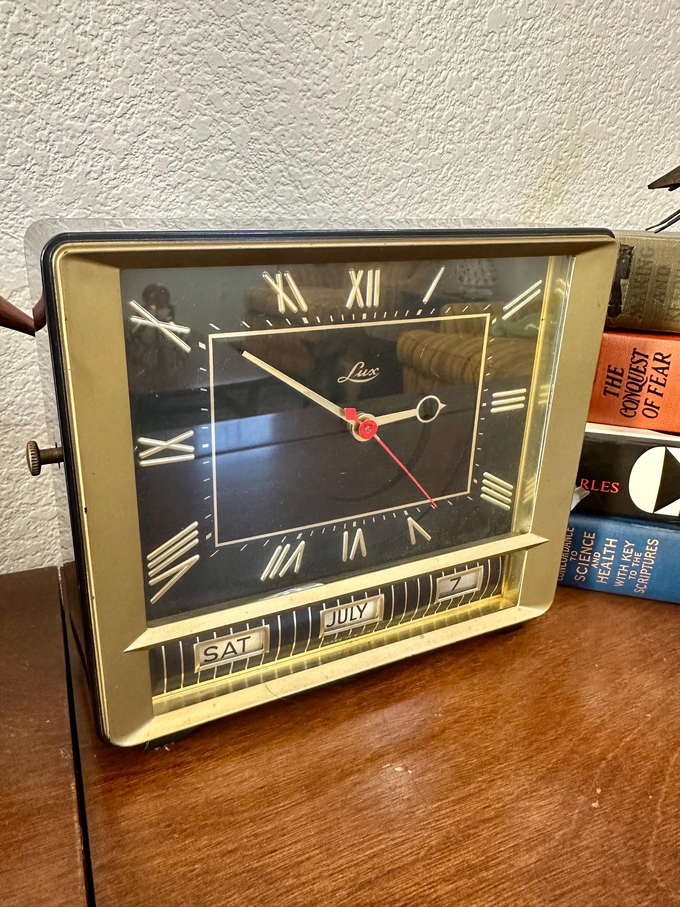 Vintage LUX Electric Clock Series 5125 W/day Month and Date - the