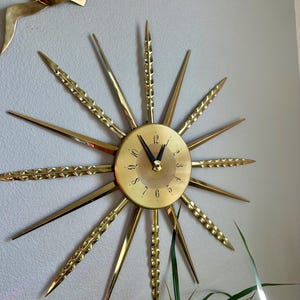 Hallmark Starburst Wall Clock