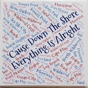 May include: A white background with a blue and red word cloud of various New Jersey shore towns and cities. The text reads 'Cause Down The Shore Everything Is Alright'.
