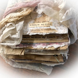 May include: A stack of vintage paper and fabric scraps with the text "always within" and "always within my heart" visible. The paper and fabric are in shades of white, brown, and pink.