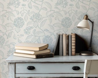Large scale light pastel blue and white floral hydrangea wallpaper in line drawing style for a nursery or traditional grandmillenial home