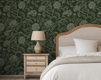 Large scale dark and moody forest green and white floral hydrangea wallpaper in a line drawing style for a grandmillenial home or farmhouse