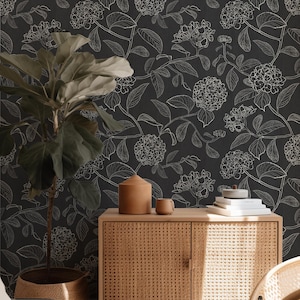 Large scale black and white dark and moody monochrome trailing floral hydrangea wallpaper in line drawing style for a botanical farmhouse