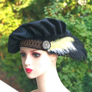 Muffin hat with feathers, Renaissance Tudor beret. Historical costume and clothing from the Middle Ages. Celtic. Poet.