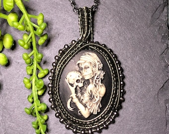 Woven wire wrapped Gothic zombie lady with a skull cameo surrounded by beads, goth, steampunk, larp