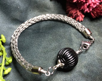 Viking Knit bracelet with a carved Jet bead, bracelet