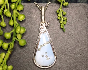 Beautiful, Blue Owyhee Opal pendant with a little face, necklace, wire work, wire art