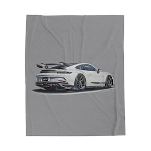 May include: White sports car illustration with black wheels and a rear spoiler. The car has the text "GT3" on the back. The image is on a gray background.