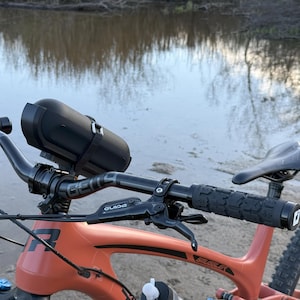 beats pill strapped to bike