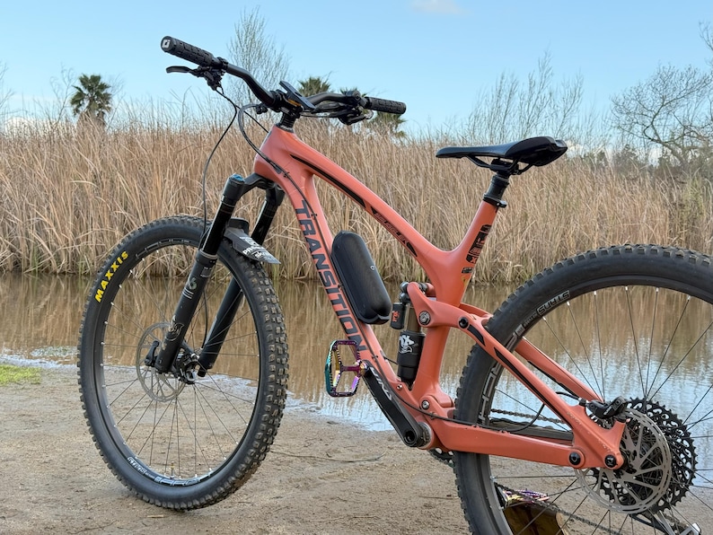 beats pill speaker on bike frame