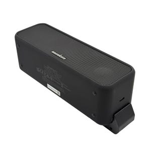 May include: A black Soundcore 2 portable Bluetooth speaker. The rectangular speaker has a mesh top and the Soundcore logo. The speaker has a built-in stand and several ports. The speaker is designed for listening to music.
