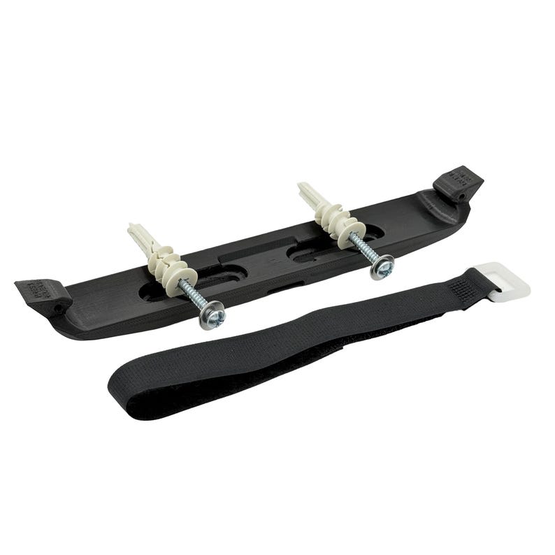 May include: A black mounting bracket with two screws and wall anchors, along with a black strap with a white plastic buckle. The bracket is designed to hold an object, and the strap is likely for securing it. The items are set against a white background.