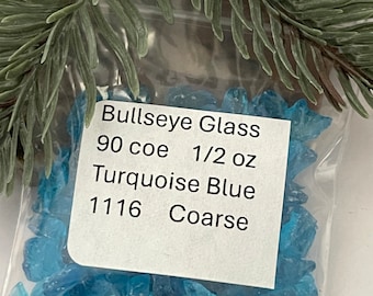 May include: A bag of turquoise blue Bullseye glass, 90 coe, 1/2 oz, 1116 Coarse.