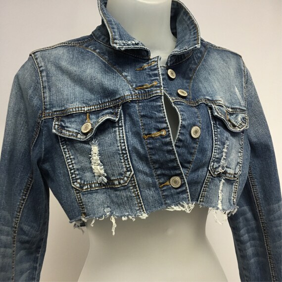 tattered denim jacket