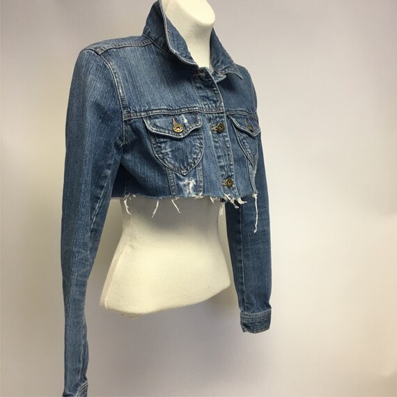 tattered denim jacket