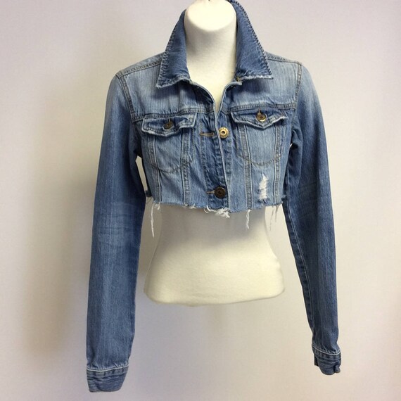 tattered denim jacket