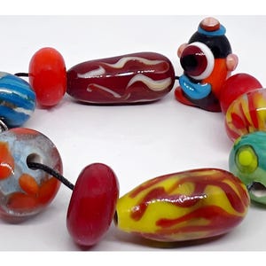 10 x Yummy mixed size OOAK hand crafted artisan lamp work glass stringed beads FREE UK Postage Ideal for jewellery making / unique gift