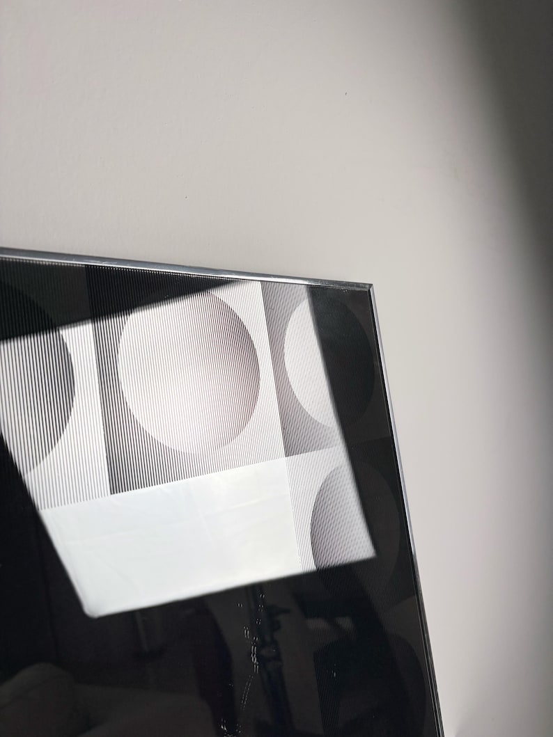 Vintage postmodern mirror with Vasarely inspired circle graphics and mirrored center, minimalist space age decor