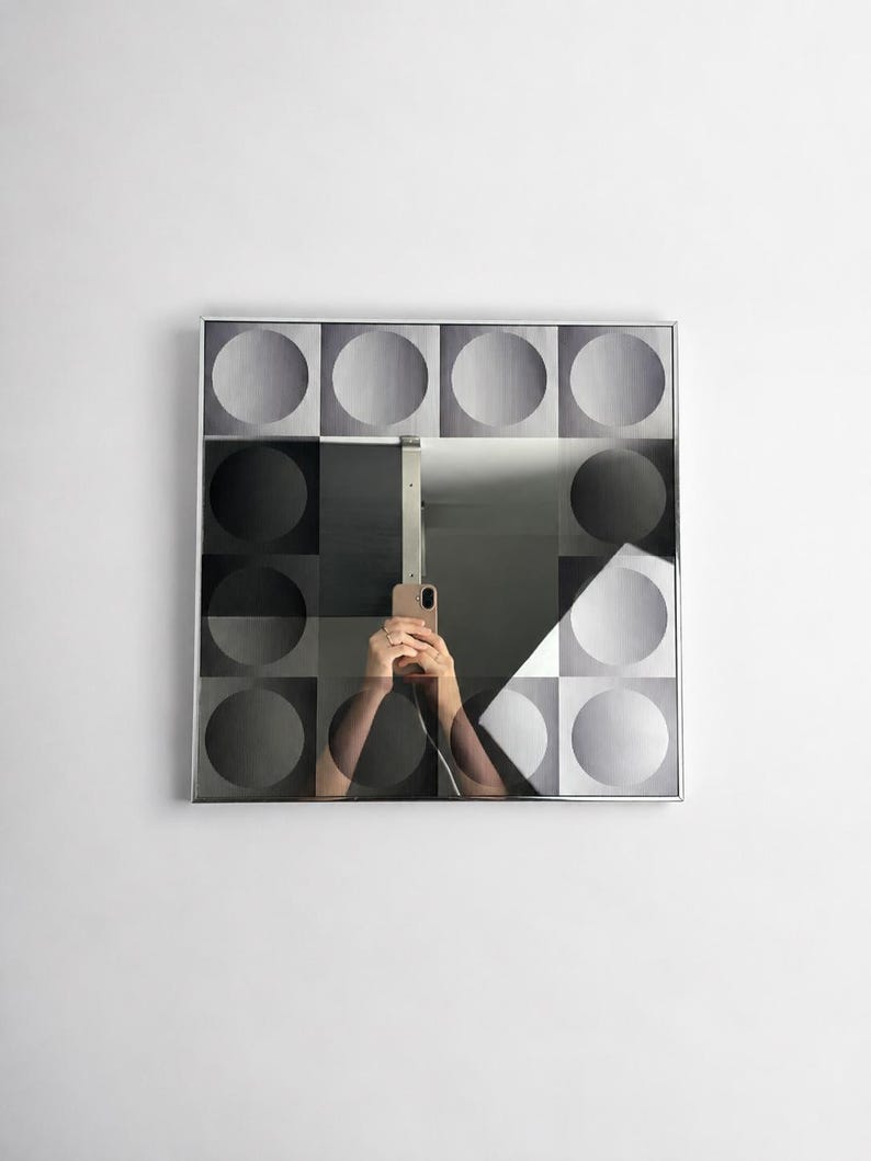 Vintage Op Art mirror with geometric black and white circle pattern, 1970s postmodern wall decor in the style of Victor Vasarely