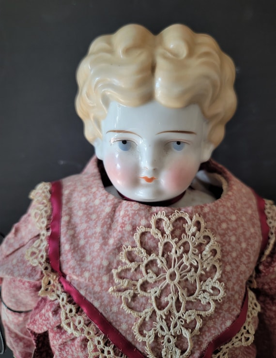 German Porcelain Low Brow Doll with Kid Leather Body circa 1890