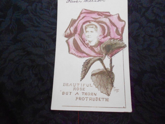 Postcard with a picture in a Rose