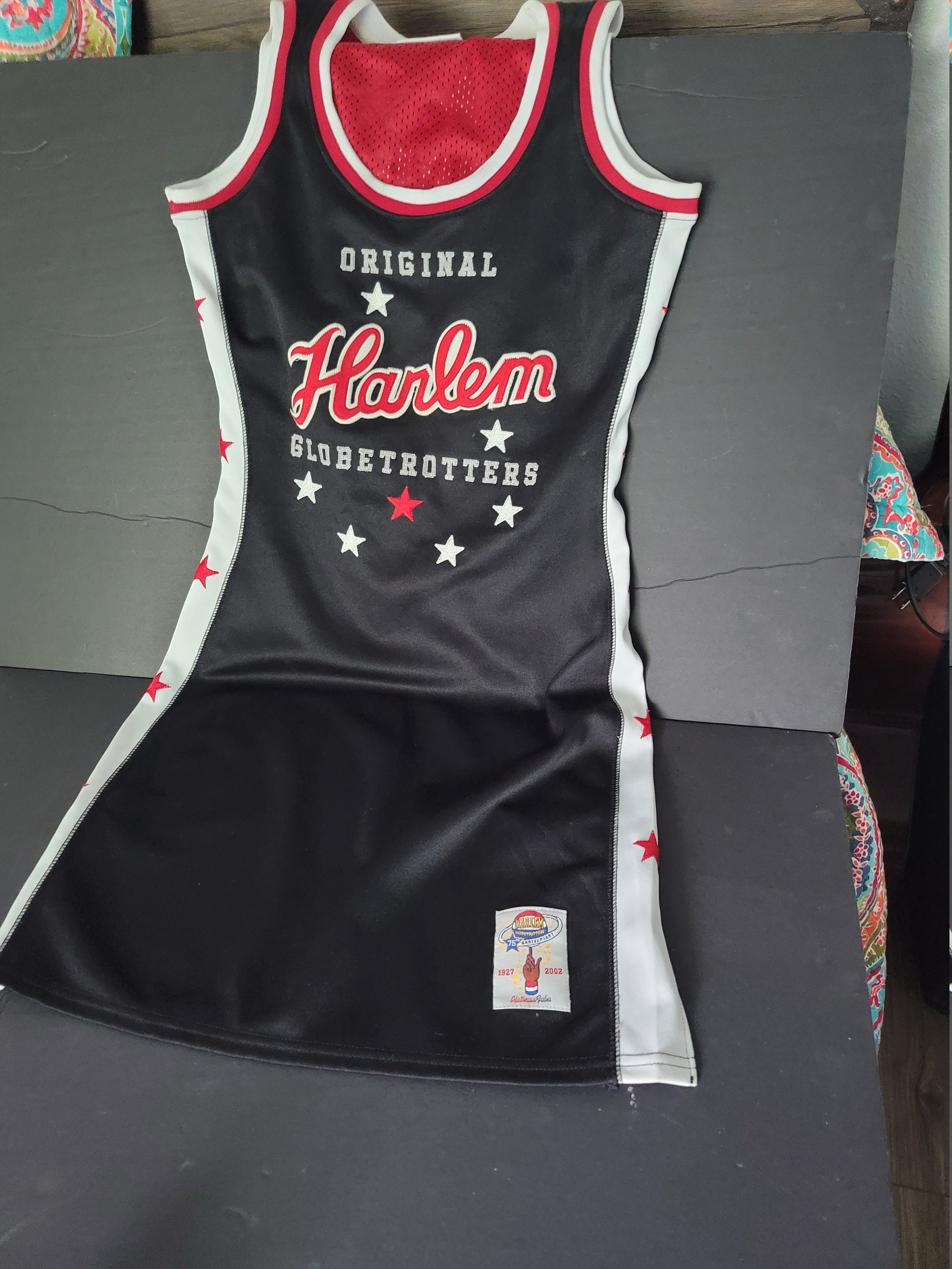 TWO CUSTOM POLYESTER SLEEVELESS SPORTS JERSEYS, CIRCA 1999